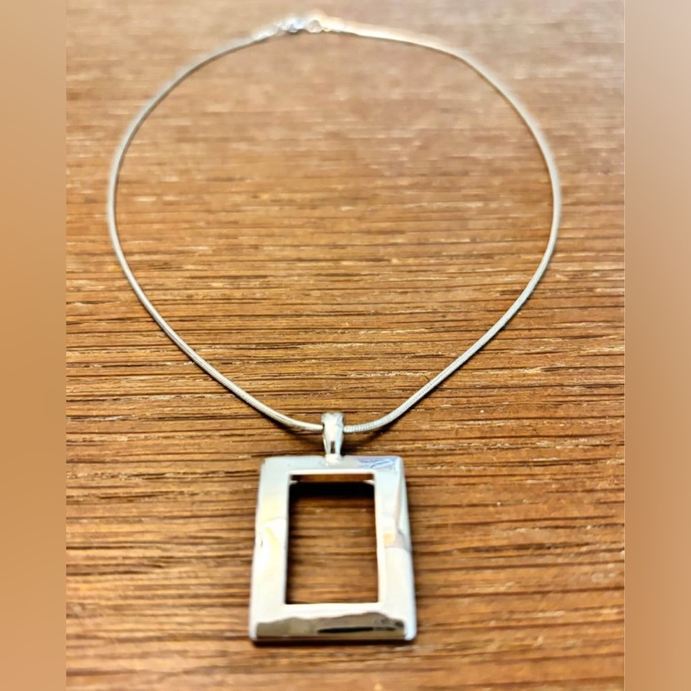 *Silver Pendant Necklace
Like New / Never Worn